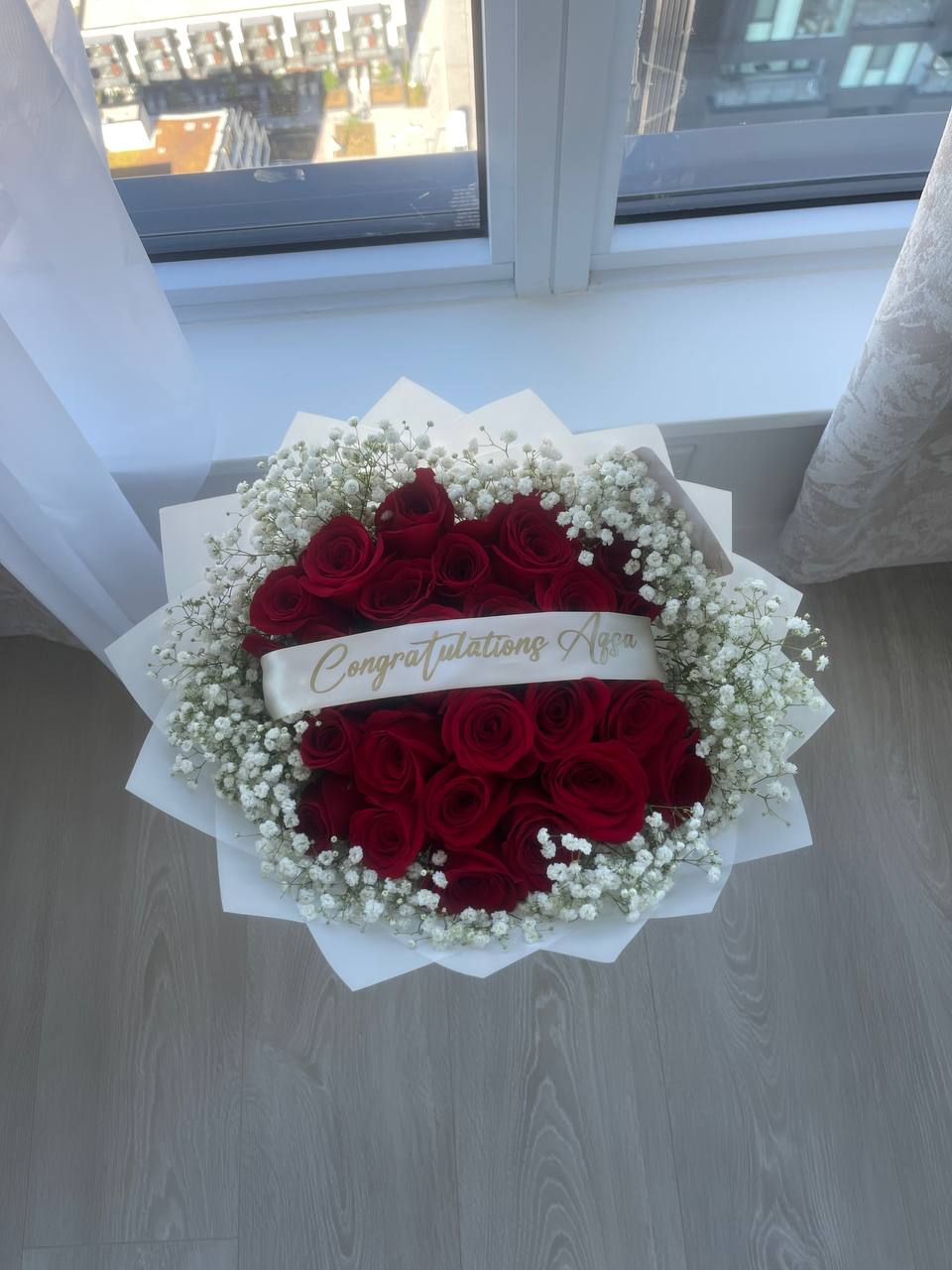 Close up of Red Rose Graduation Bouquet with Baby’s Breath
